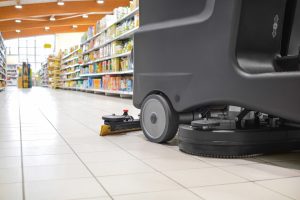 Scrubber Drier cleaning supermarket floor