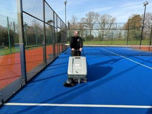 Lavor SWL 700 ET Court Deluxe indoor sports sweeper using its large dust panel filter and electric filter shaker.