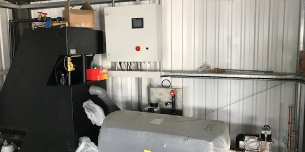 Installation of a industrial water clarifying module system at a new Audi dealership commercial facility.