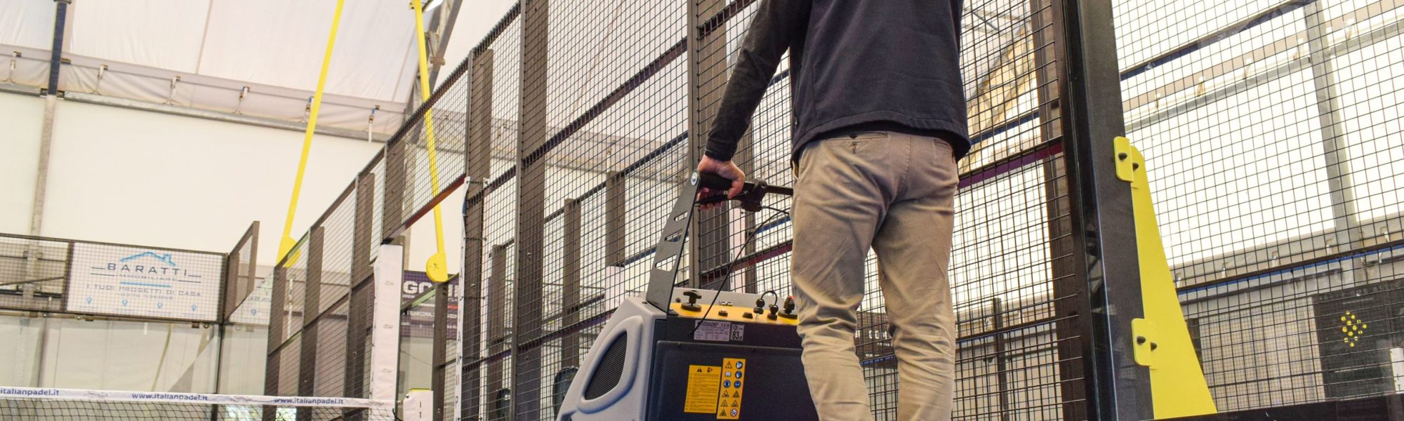 A high-performance commercial walk-behind floor scrubber dryer machine showcasing modern cleaning technology for large facilities.