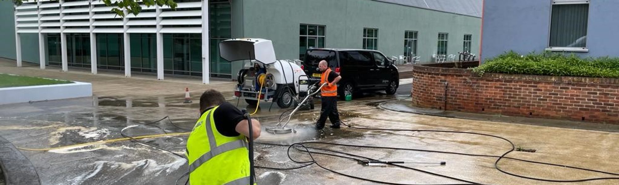Cleaning using a trailer pressure washer